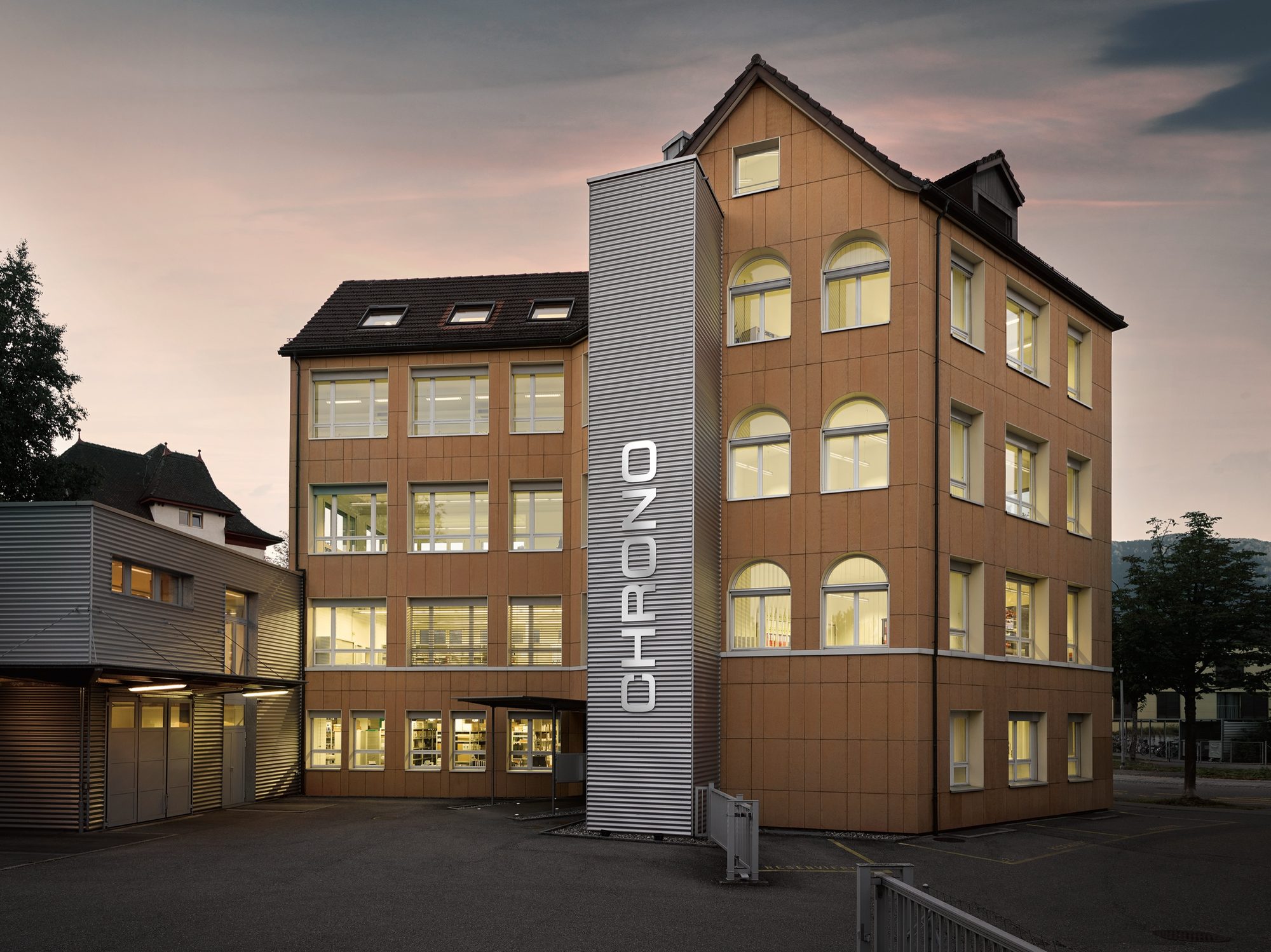 The Chrono AG building in Solothurn, Switzerland, at dusk