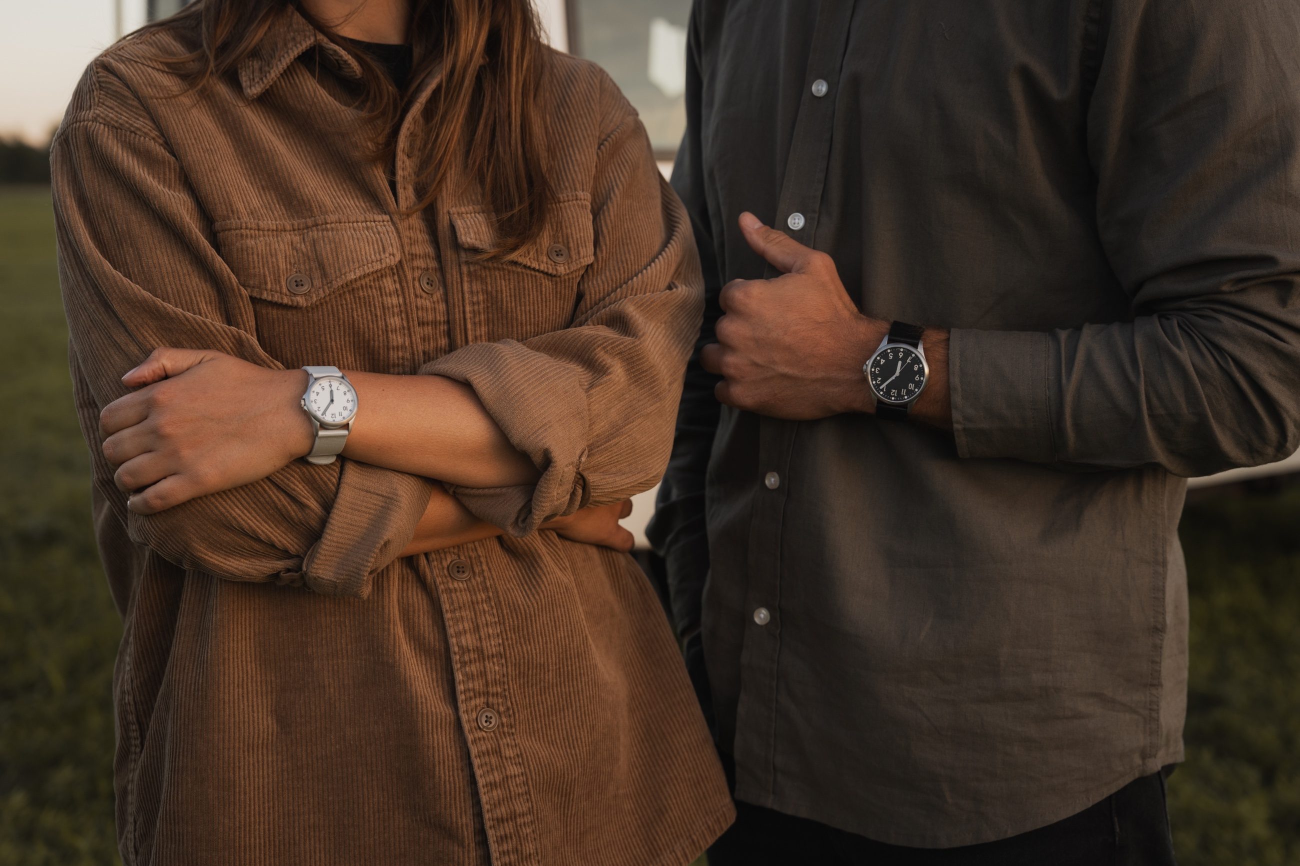 Two people outdoors, both wearing Mudita Radiant